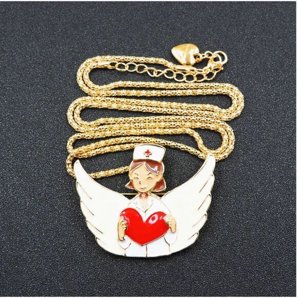 Betsey Johnson Jewelry - Betsey Johnson Necklace Enamel Angel Nurse with Heart Pendant Gold Tone